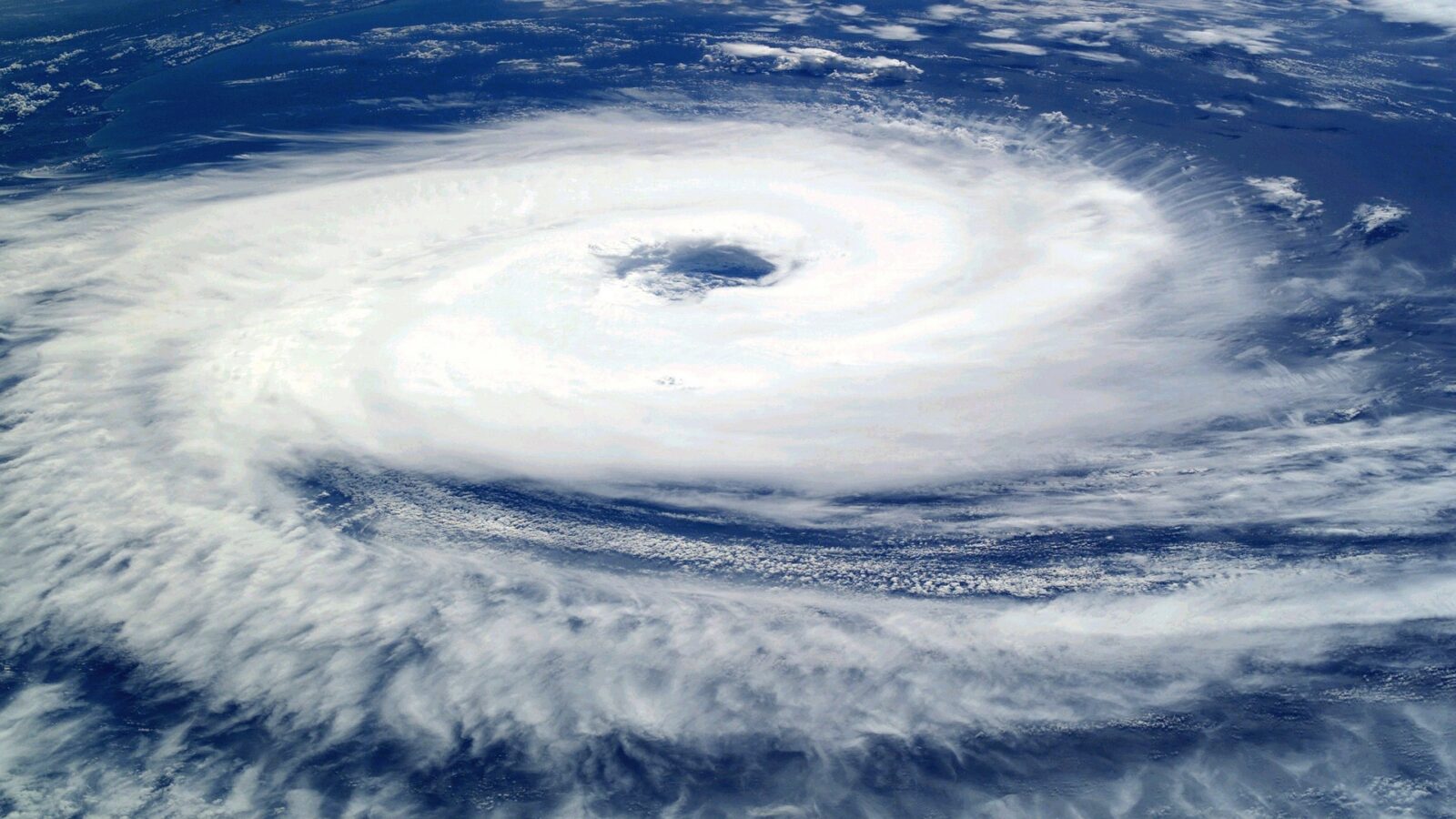 Satellite view of a hurricane's eye and surrounding cloud bands