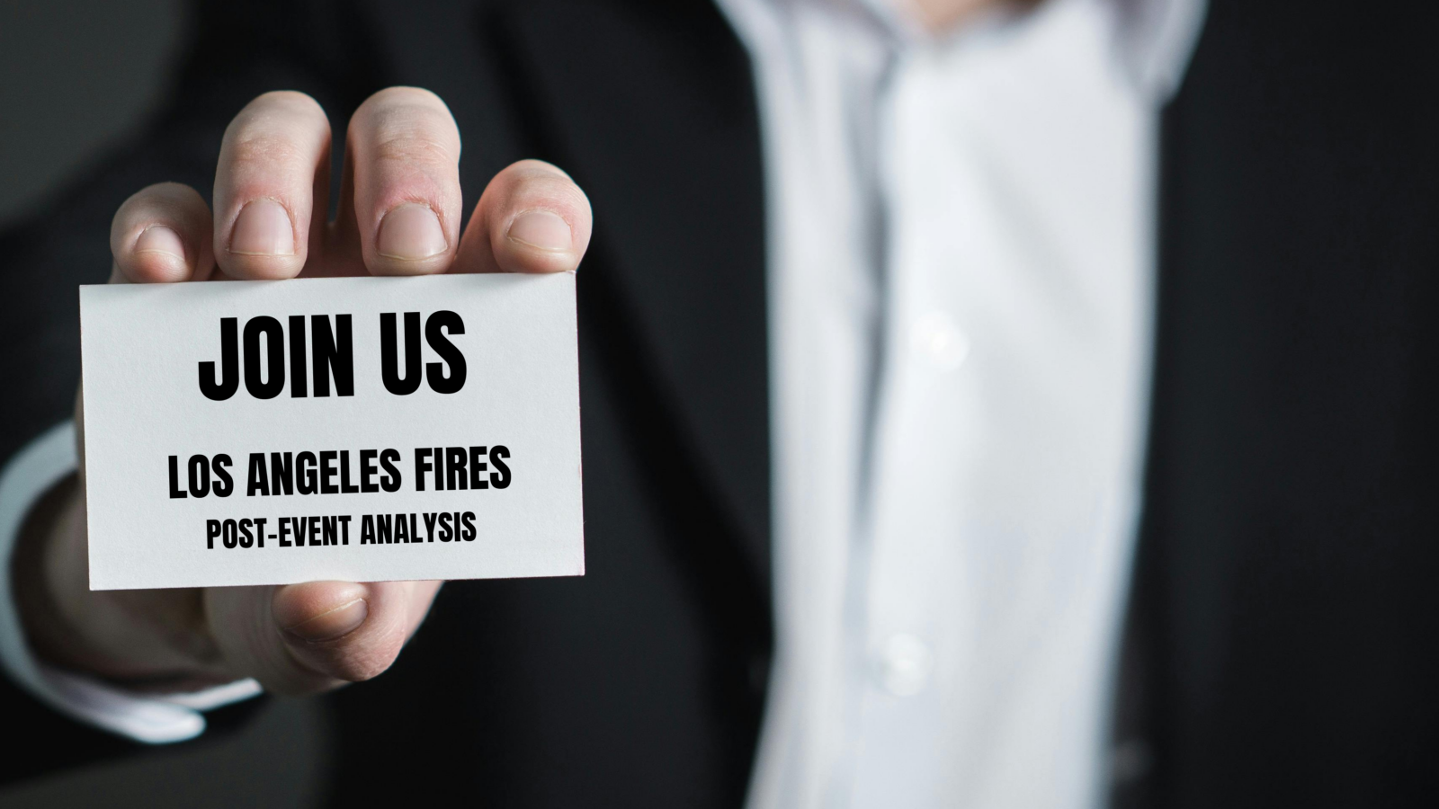 Hand holding a card inviting viewers to a Los Angeles fires post-event analysis